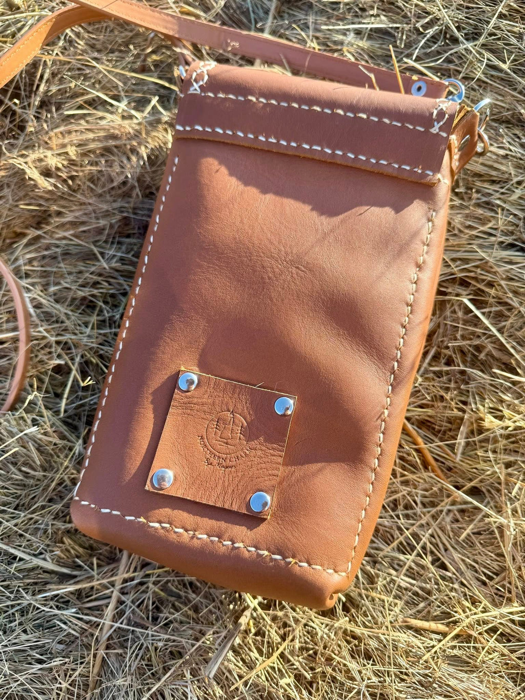 The Nomad Concho Crossbody