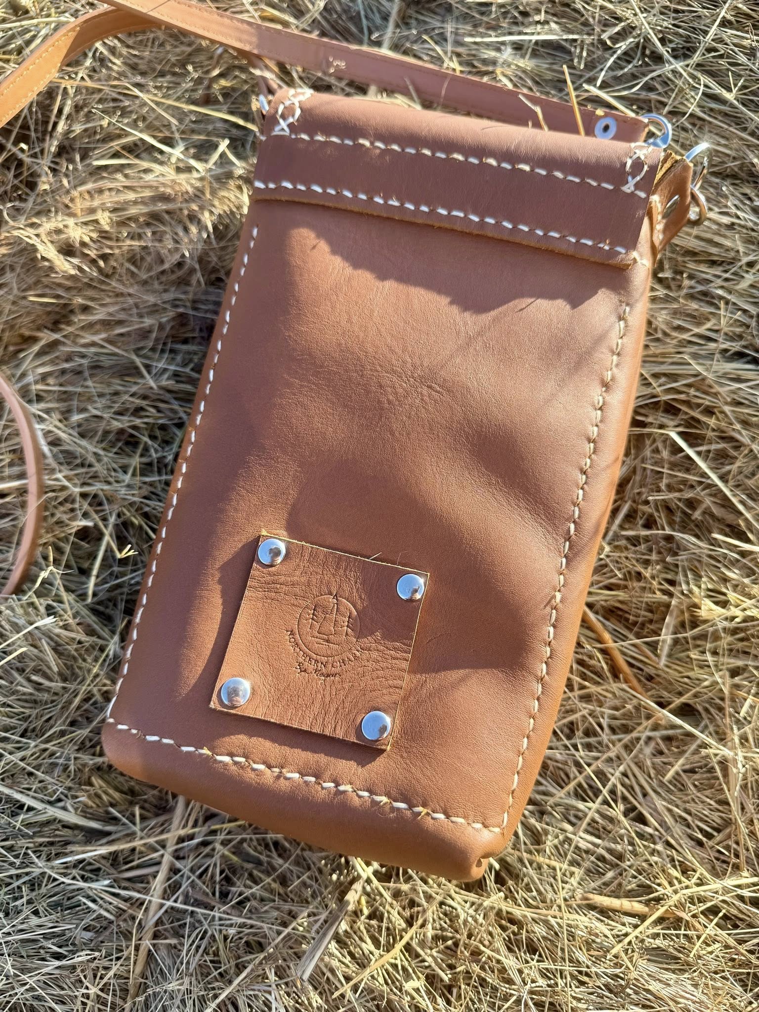 The Nomad Concho Crossbody